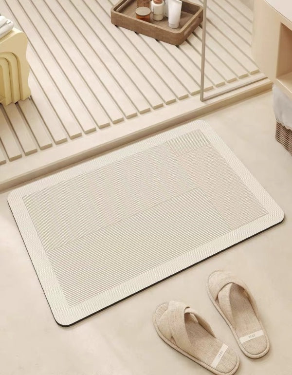 Tapis de salle de bain antidérapant en silicone absorbant l'eau blanc crème