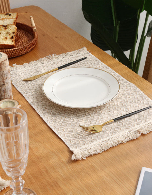 Lot de 2 sets de table isolants en jute avec pompons 