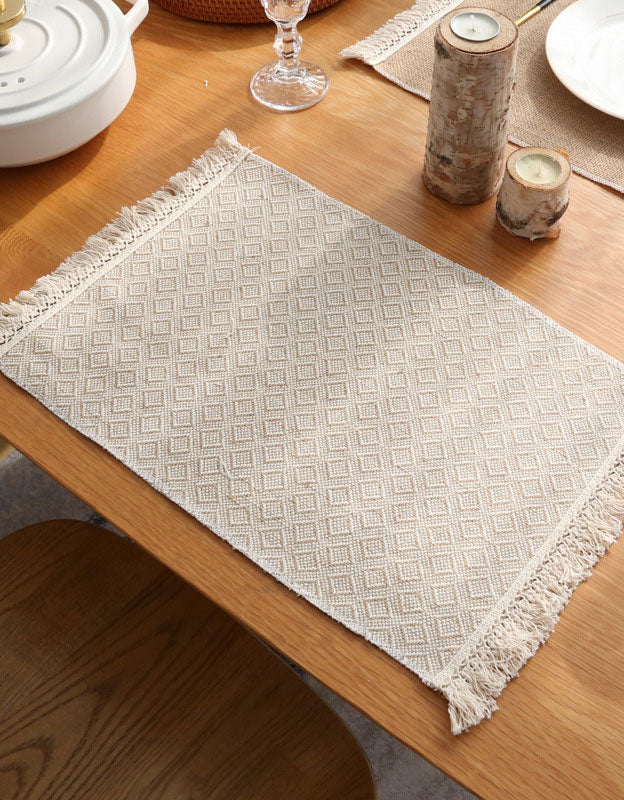 Lot de 2 sets de table isolants en jute avec pompons 