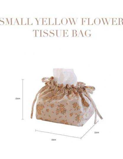 Bolsa de pañuelos con flores amarillas pequeñas